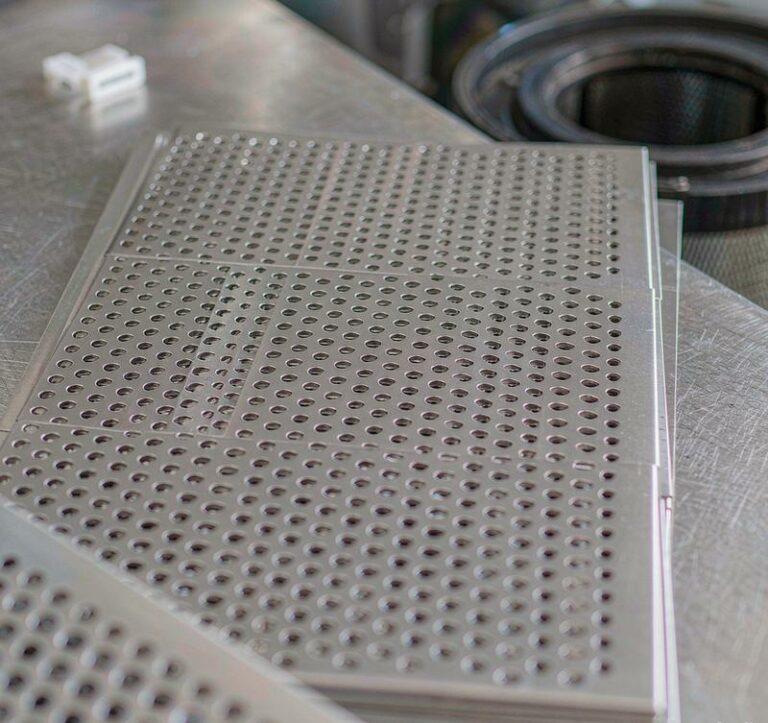 Perforated aluminum sheets used as filter screens and grilles in industrial equipment